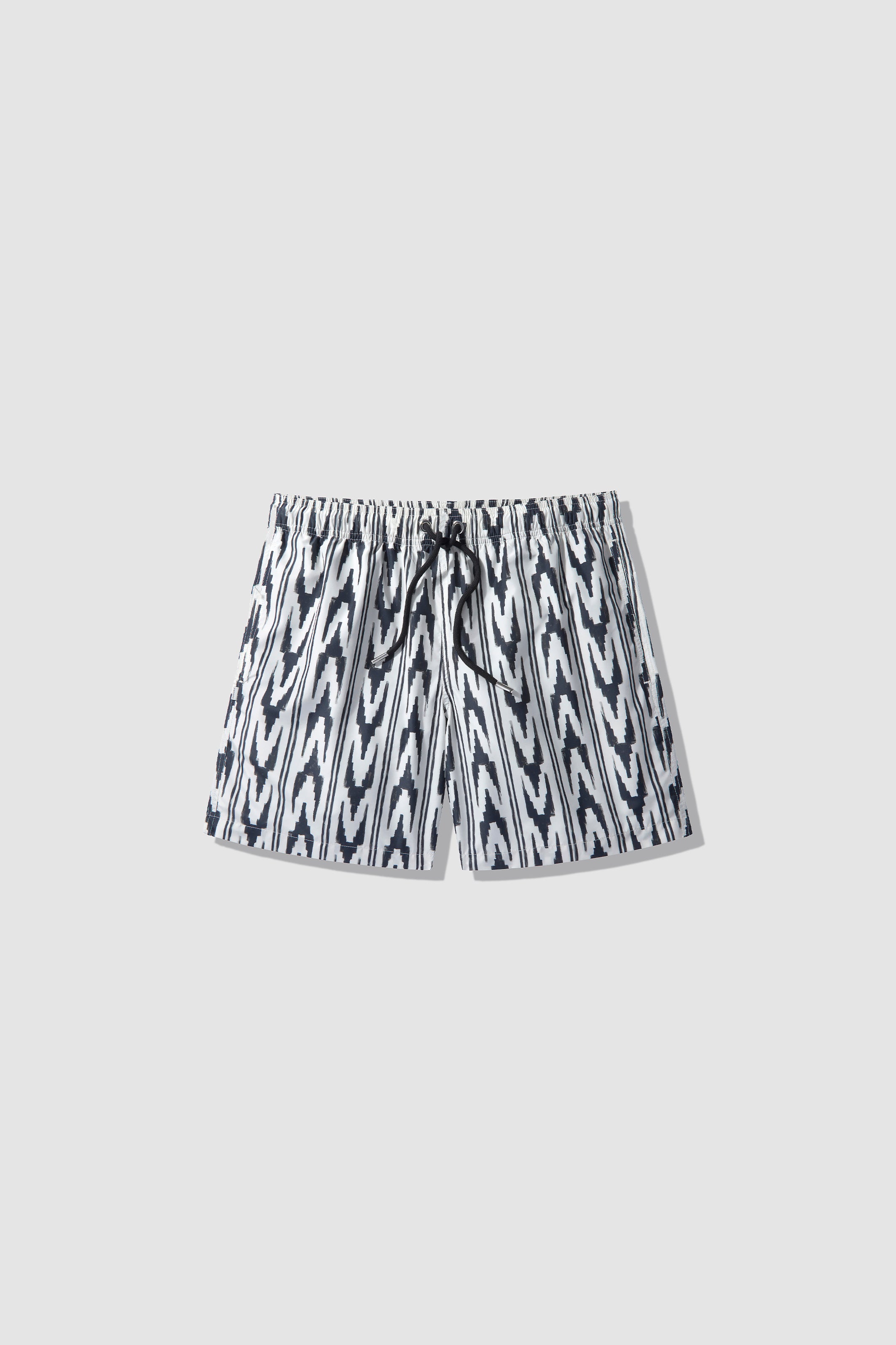 WHITE ABROBAD SWIM SHORTS